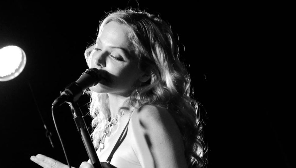 Storm Large singing.