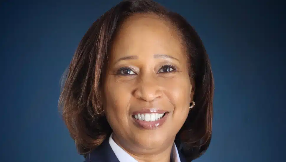 Headshot of middle-aged female bank executive.