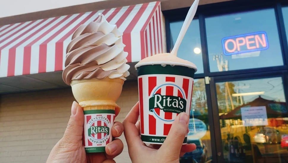 Rita's custard on a cone and a cup of water ice.