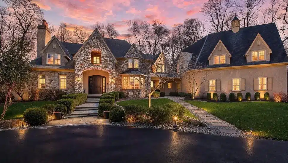 French Colonial-style home at sunset.