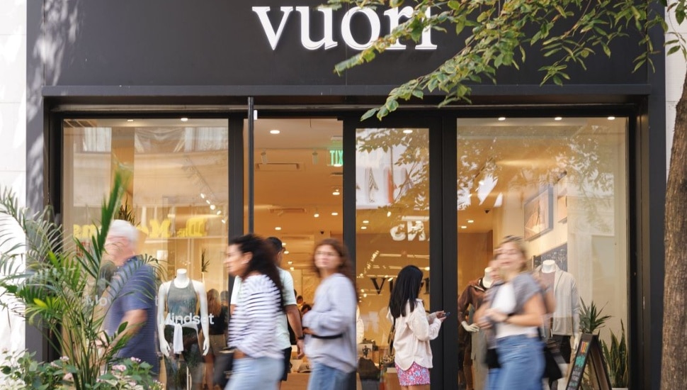 People walking by Vuori store in Center City Philadelphia.