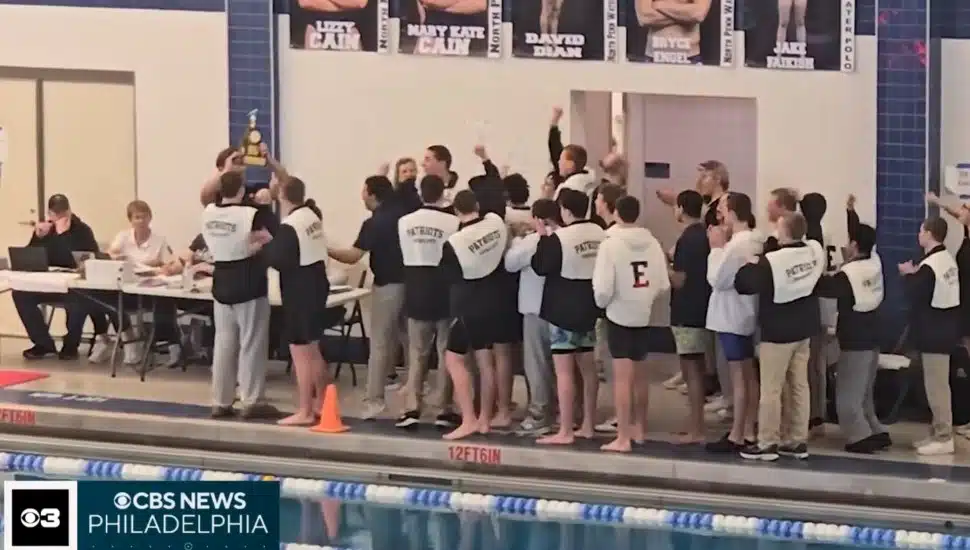 Central Bucks East swim team celebrating.