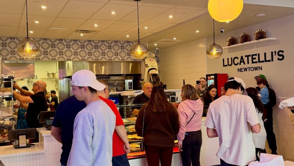 Customers in Lucatelli's Pizzeria Newtown.