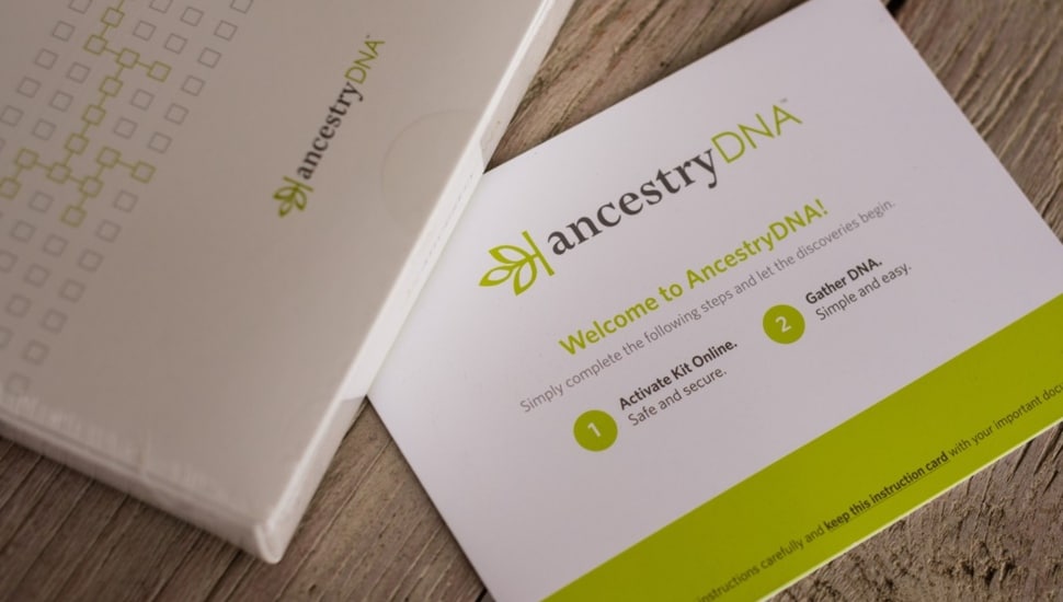 Ancestry DNA kit sits on table.