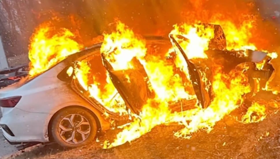The burning car at the recent turnpike car crash site in Malvern.