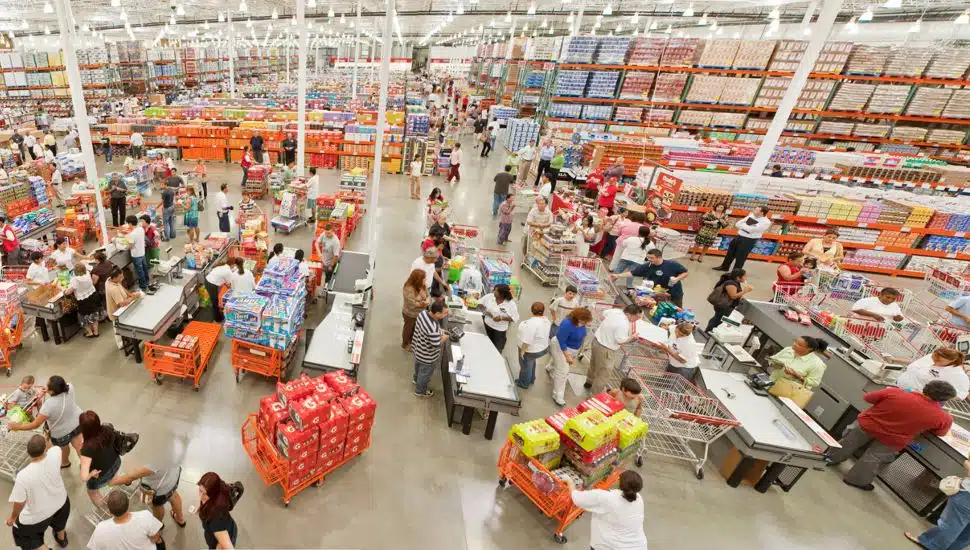 Registers at Costco with customers shopping.