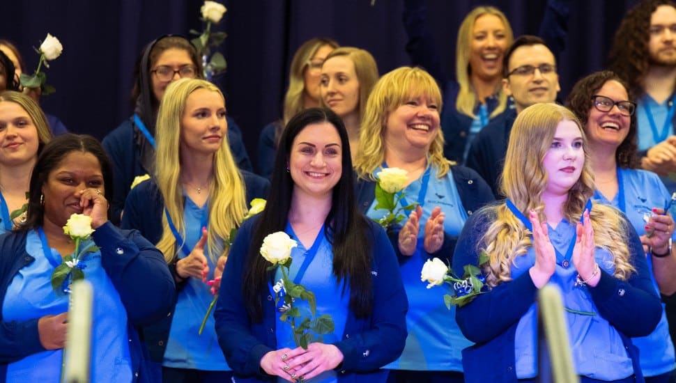 Soon-to-be nurses celebrate after receiving their pins at Bucks County Community College’s 55th Annual Nurses Pinning Ceremony.