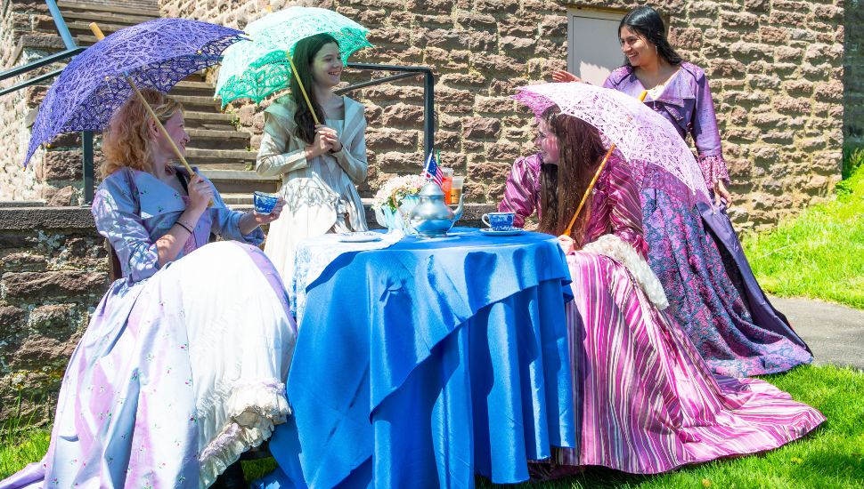 Guests arriving at Bucks County Community College’s Salute to Mothers Scholarship Tea on May 1 were greeted by students in colonial costumes – courtesy of Bristol Riverside Theatre.