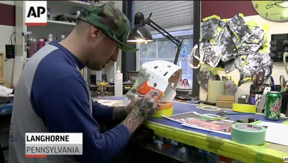 Franny Drummond works on a goalie mask in his Langhorne studio.