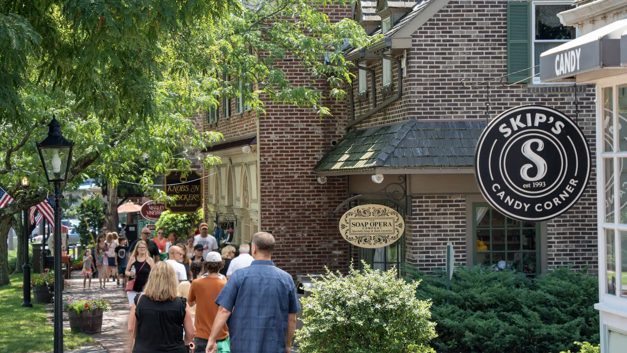 People walk the brick walkways in Peddler's Village.