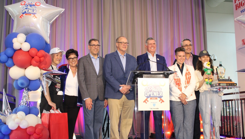 City and national leaders, corporate leaders, tourism executive, and business owners celebrating.