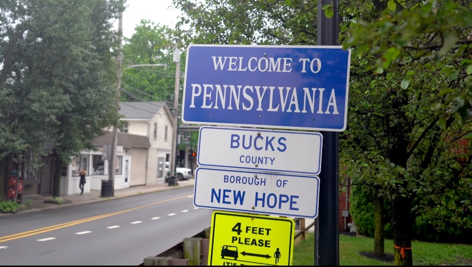 Sign welcoming people to Pennsylvania and Bucks County.