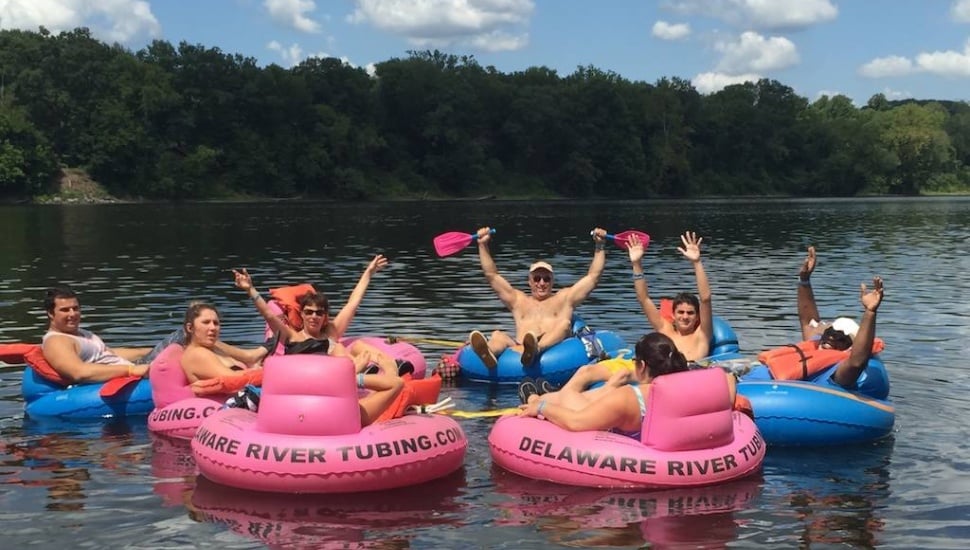A group of friends makes the most of a summer afternoon floating the Delaware River on a sunny day near Frenchtown.