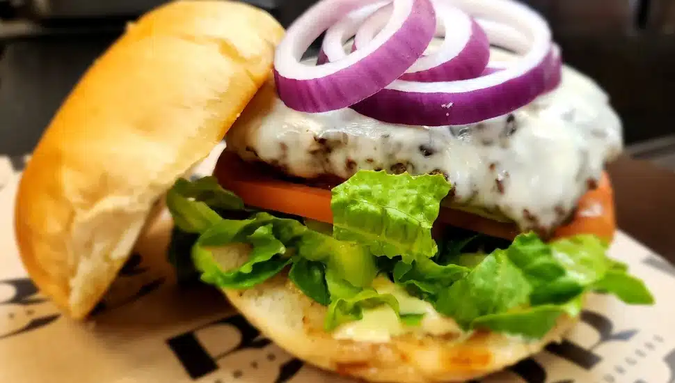 A fresh-made burger from Wings To Go.