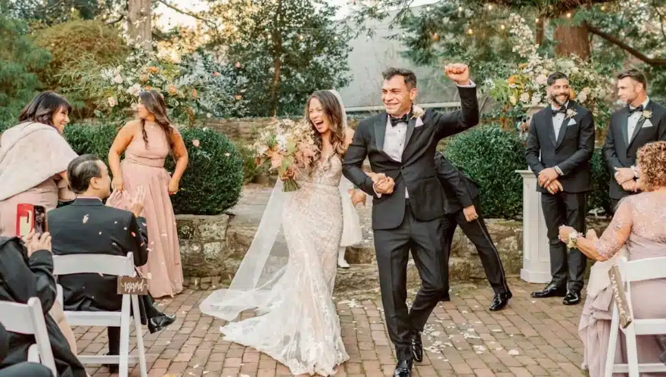 a couple celebrate their vows at HollyHedge Estate