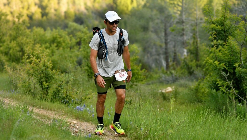 Meridian Bank Mortgage Loan Officer Michael Dectis runs along a wooded trail during a 100-mile ultramarathon.