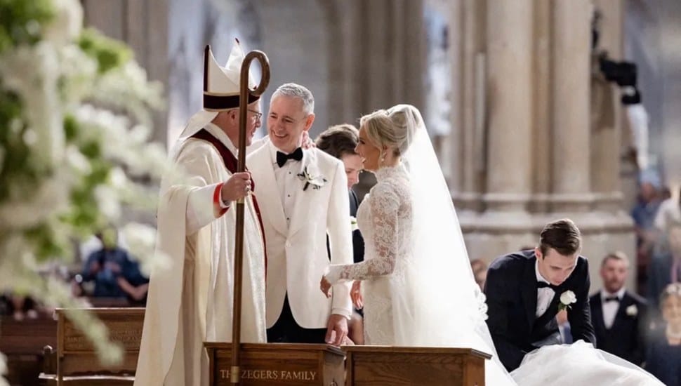 Bucks County Congressman Brian Fitzpatrick and Fox News correspondent Jacqui Heinrich share a moment at the altar of St. Patrick's Cathedral at their June 20 wedding ceremony.