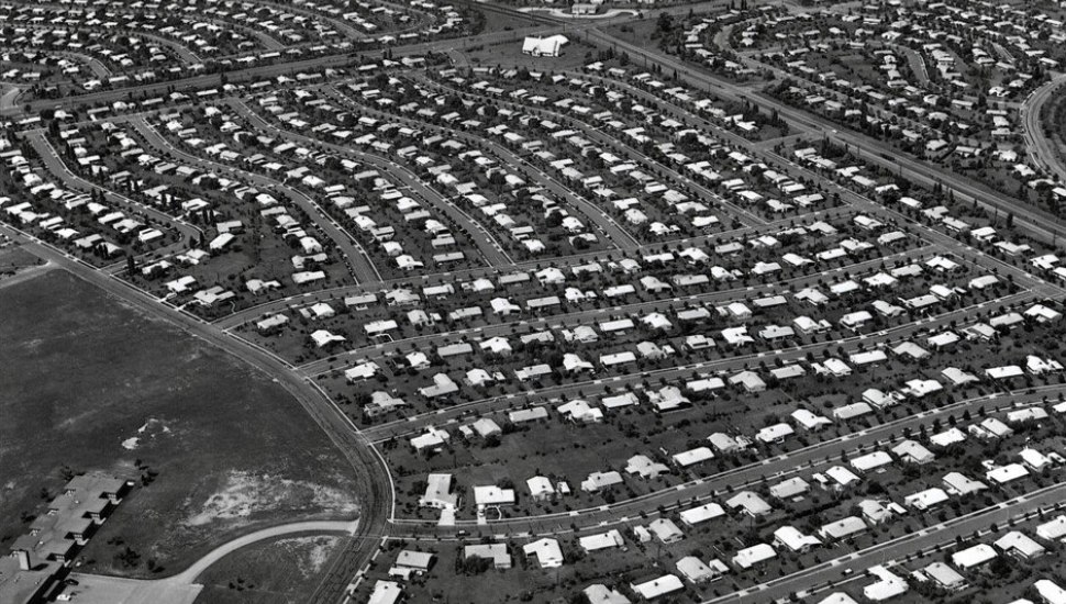 Levittown, PA circa 1959. Rows of nearly identical homes stretch to the horizon, a visual record of the assembly-line building method that Levitt & Sons used to construct as many as 40 houses a day.